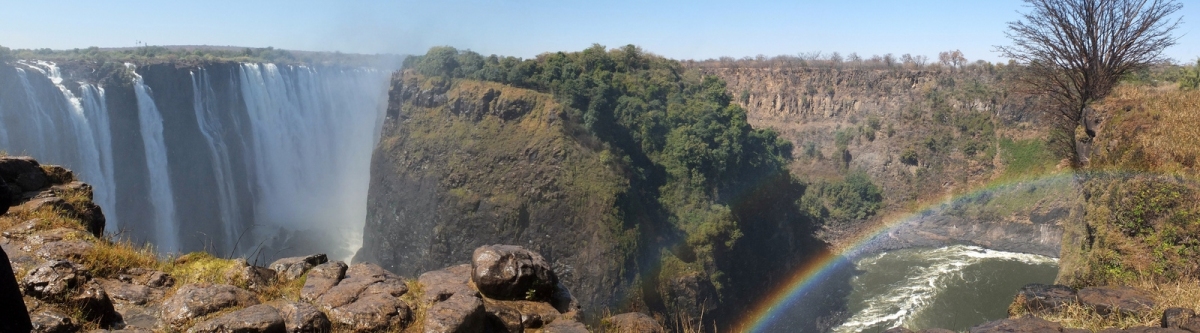Panorama: Victoria Falls and Rainbow (Tee La Rosa)  [flickr.com]  CC BY-ND 
License Information available under 'Proof of Image Sources'